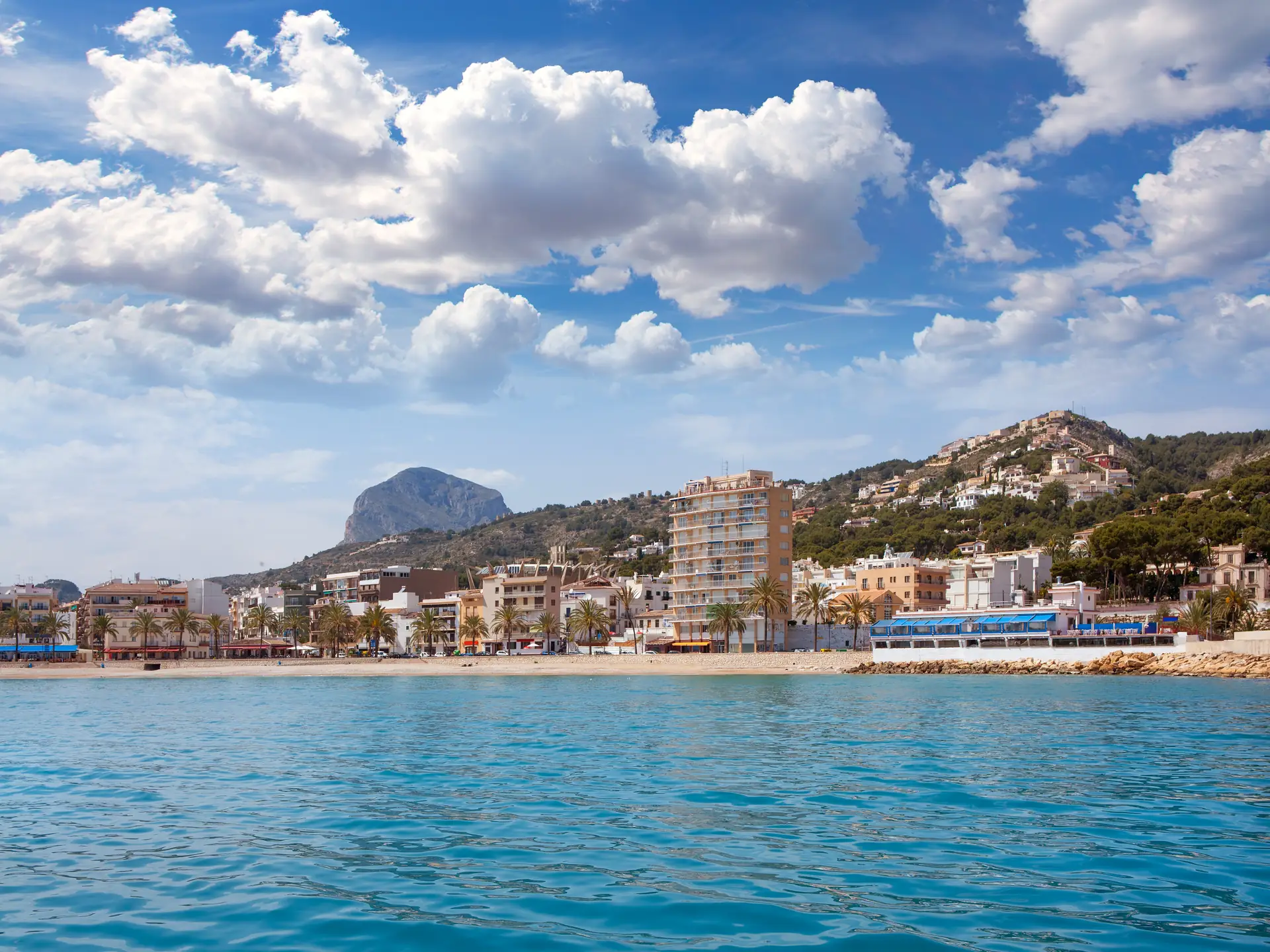The harbour of Jávea seen from the water, with the Montgó in the background